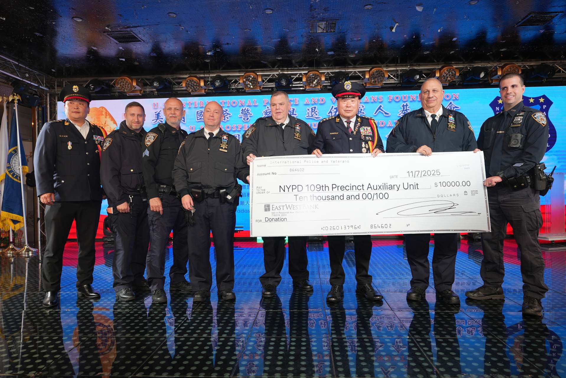 NYPD 109th Precinct Auxiliary Unit $10,000 donation check presented at IPVF gala